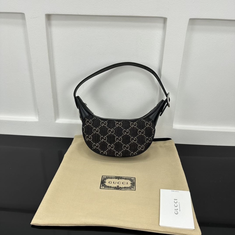 G*u*i top handle bags